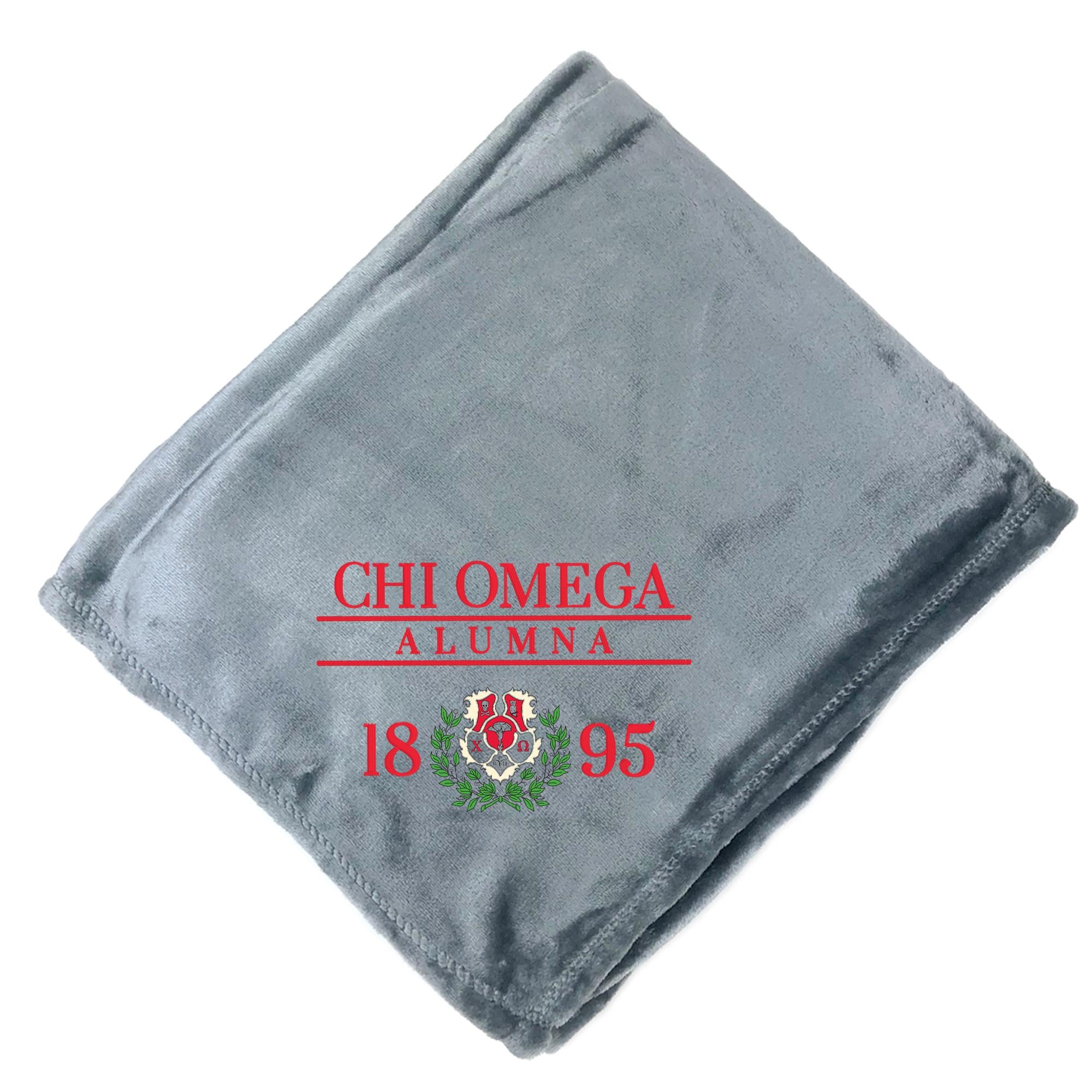 a gray blanket with red text and a red emblem on it.