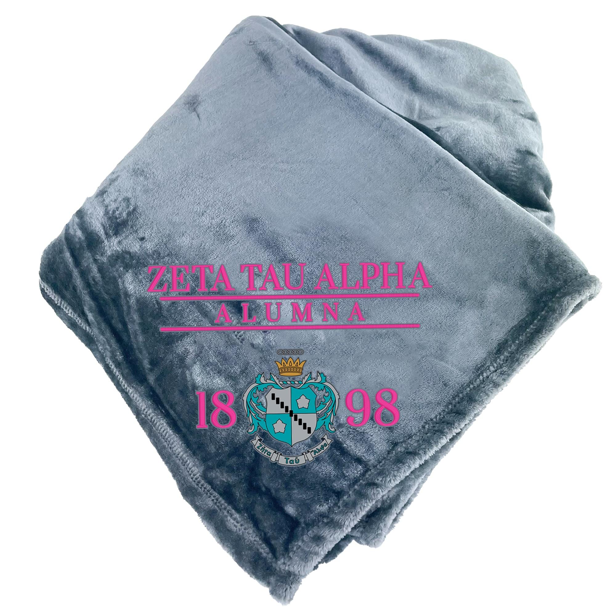 a gray blanket with text and a crest printed on it.