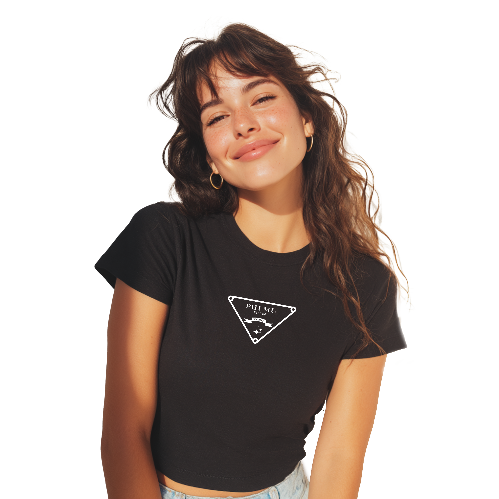 A young woman with long brown hair is smiling and posing for the camera, wearing a black t-shirt with a white triangle design.