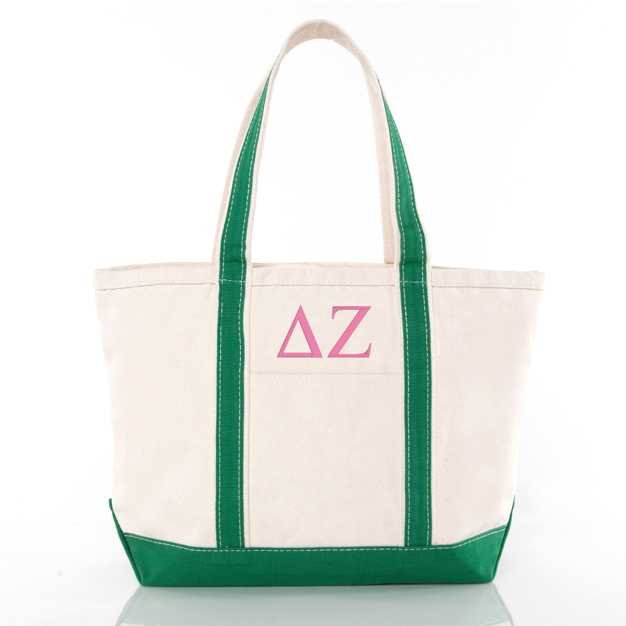 A beige tote bag with green trim and a pink delta z logo on the front.