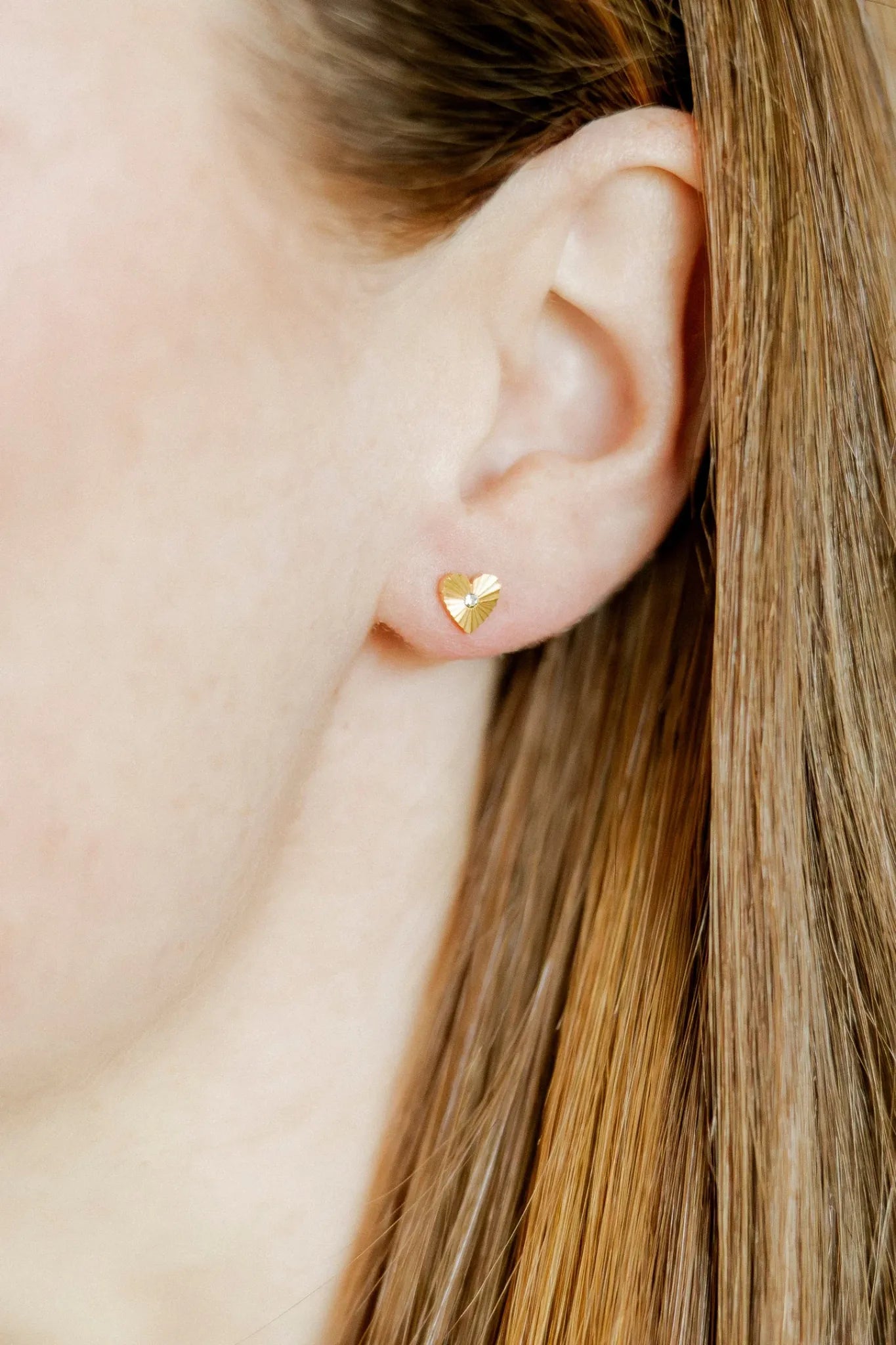 Andrea Heart Gold Screwback earrings worn