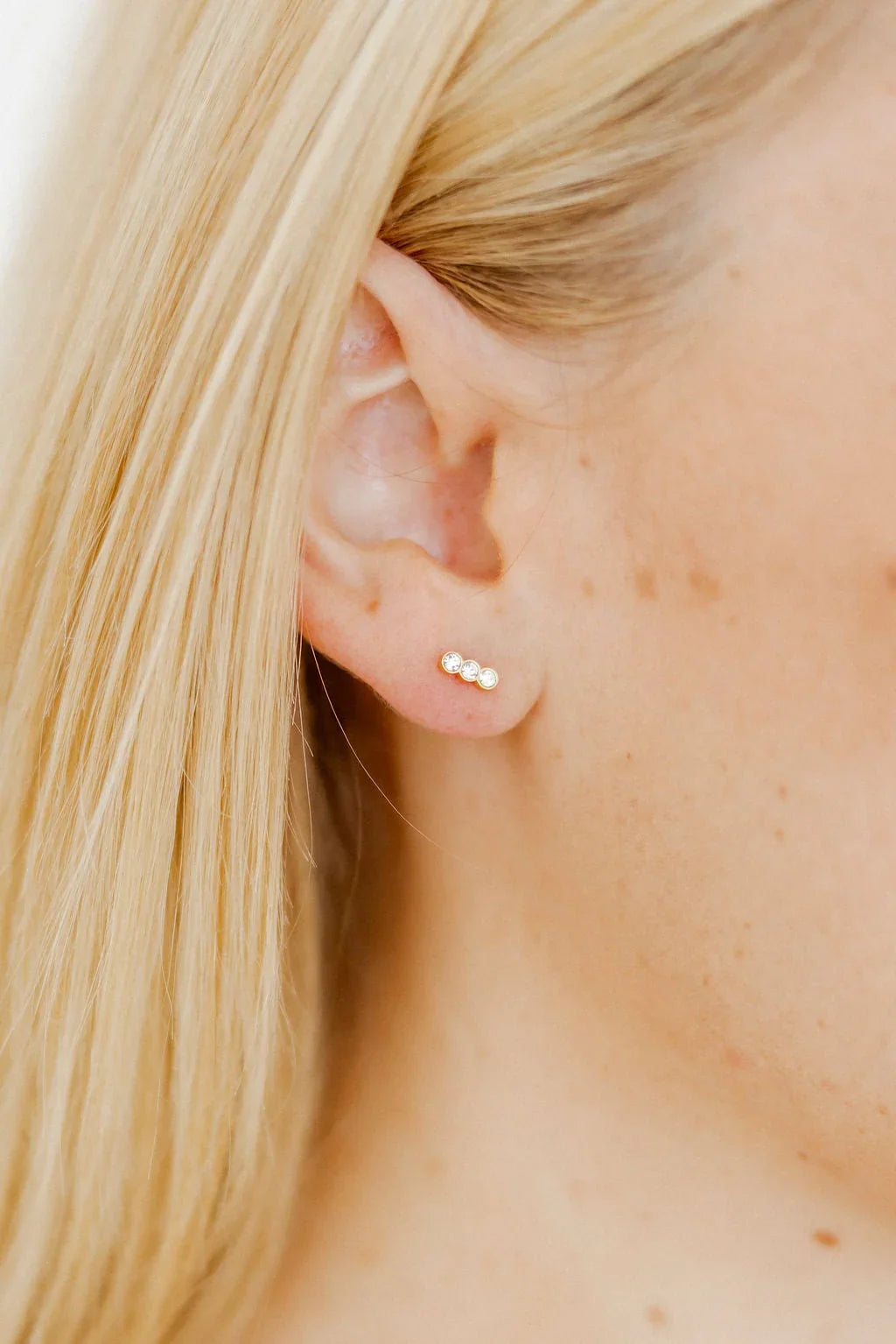 Poppy Gold Screwback earrings worn