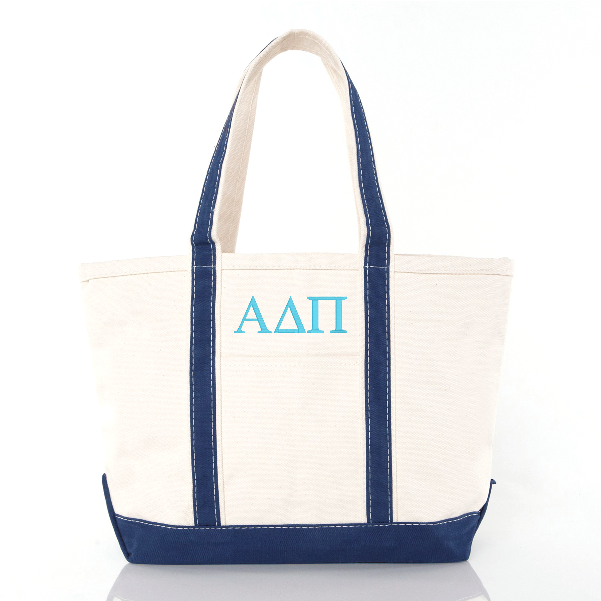 A white tote bag with navy blue trim and the letters 'ΑΔΙΑ' printed on it.