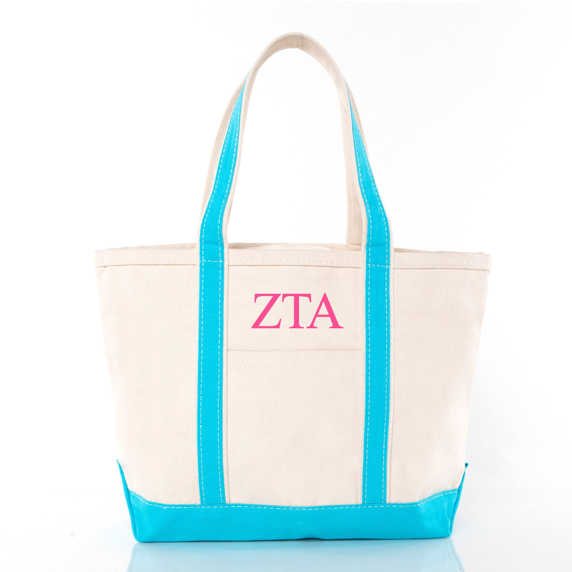 A beige tote bag with blue trim and the text "ZTA" printed on it.