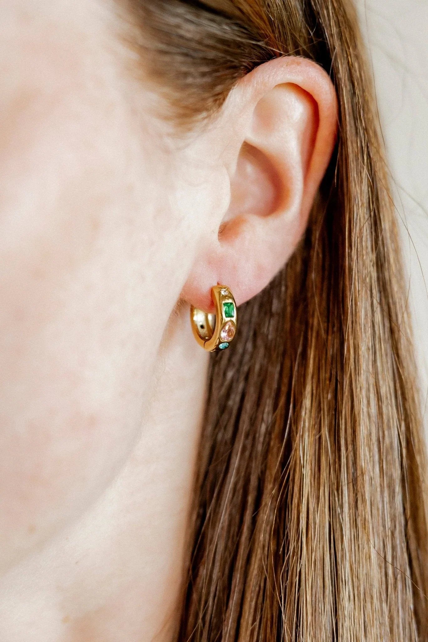 August Gold Huggie earrings worn